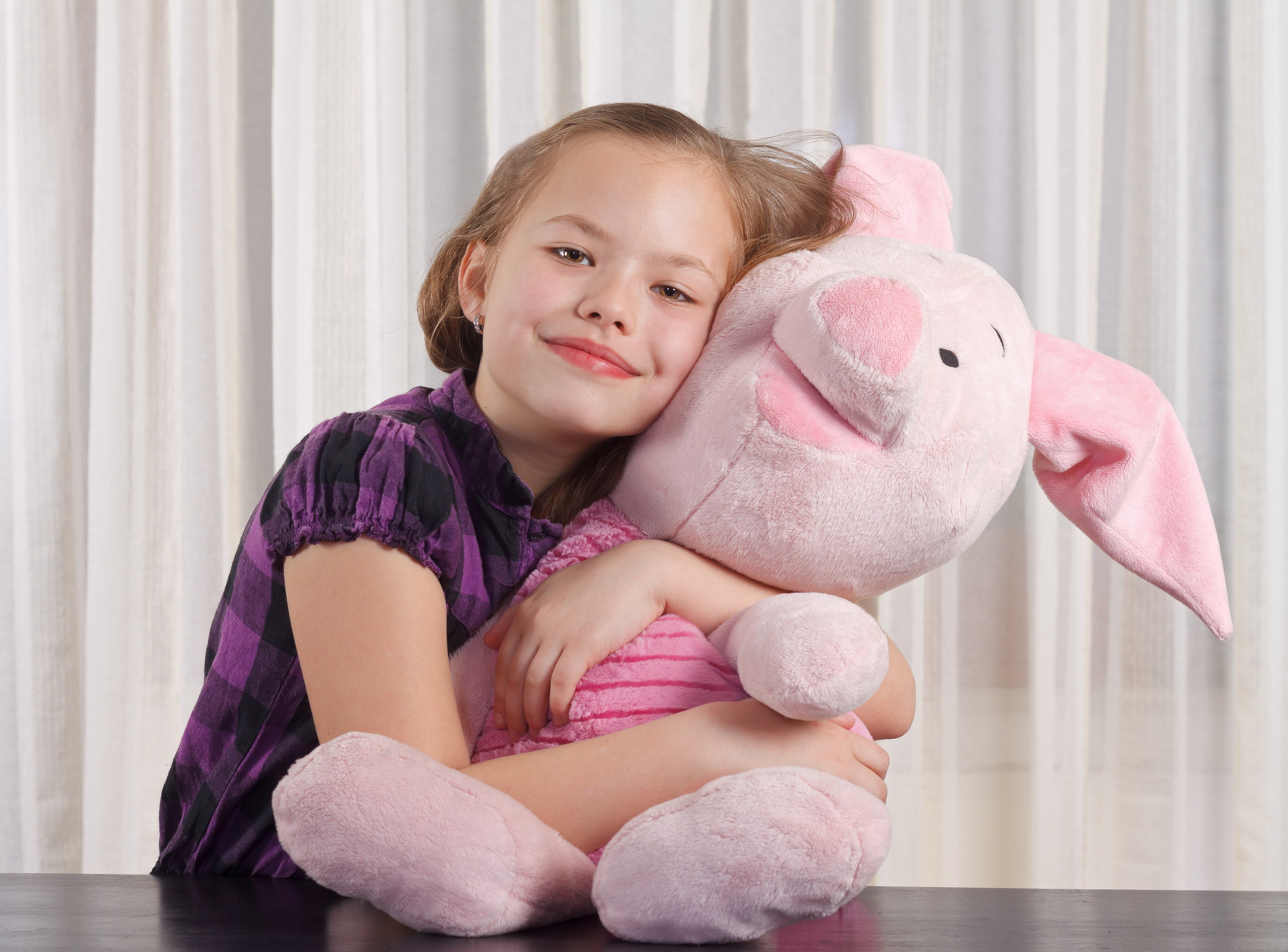 Girl with plush toy